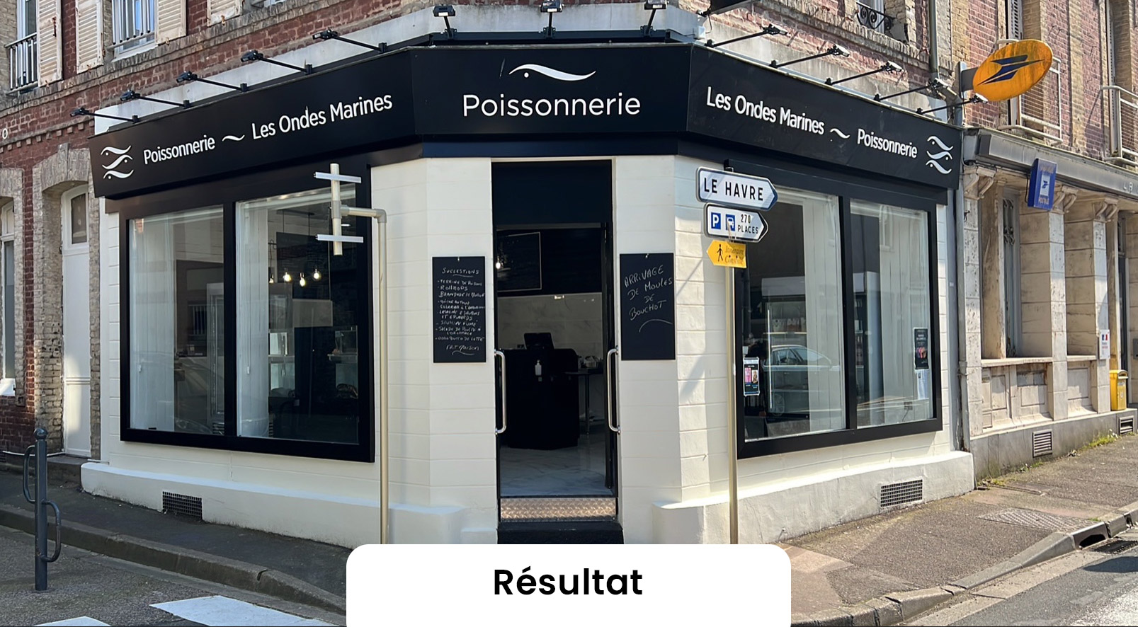 Façade après habillage (enseigne) de la poissonnerie "Les Ondes Marines"